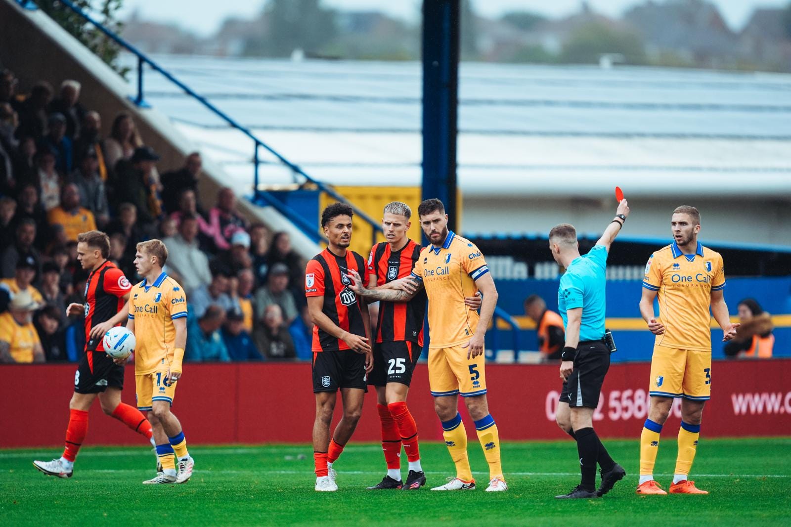 Huddersfield Town over-complicate 10-man test at Mansfield Town but remain unbeaten