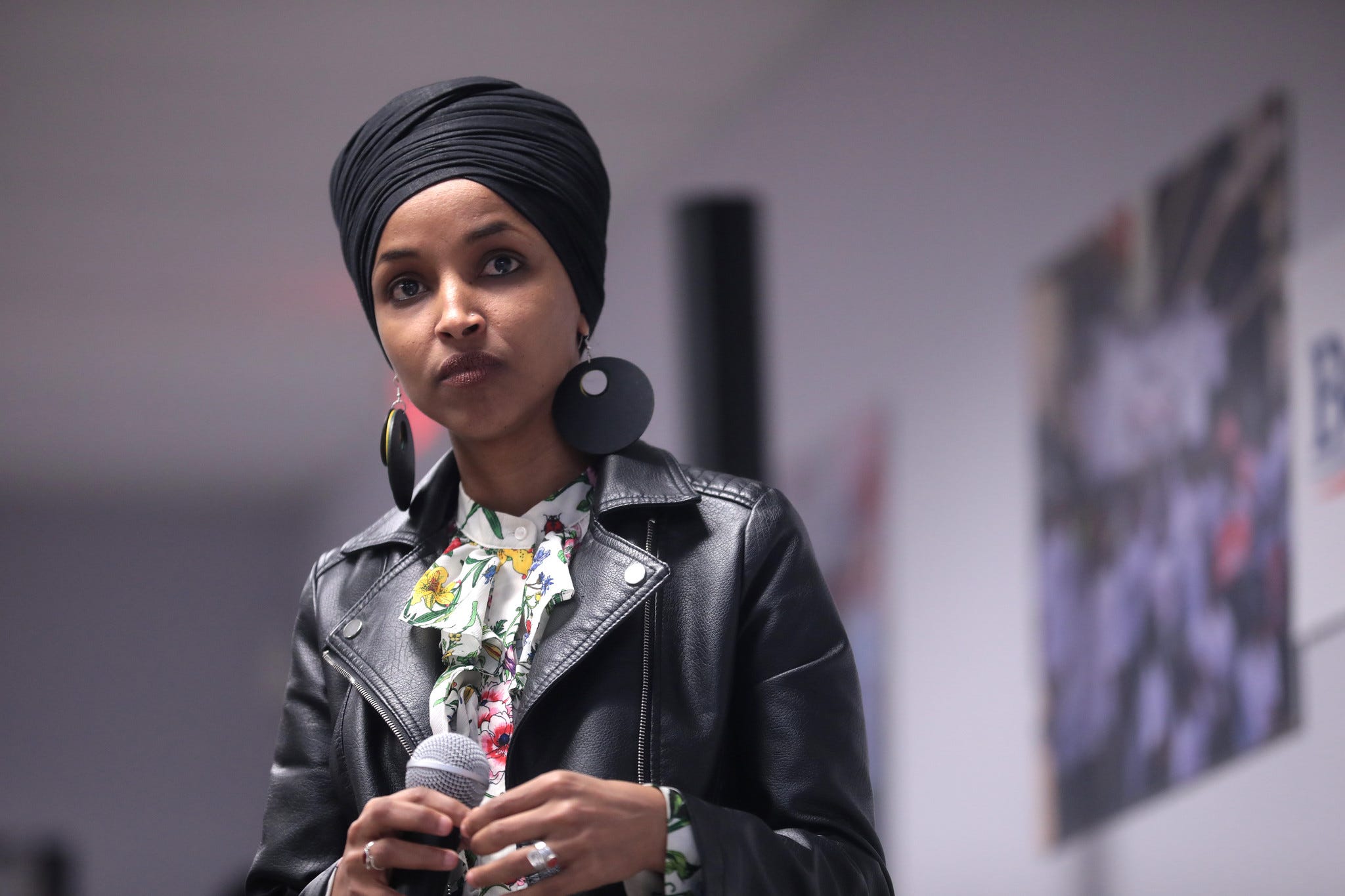 Ep. 147: Republicans Oust Ilhan ft. Emma Vigeland - podcast episode cover