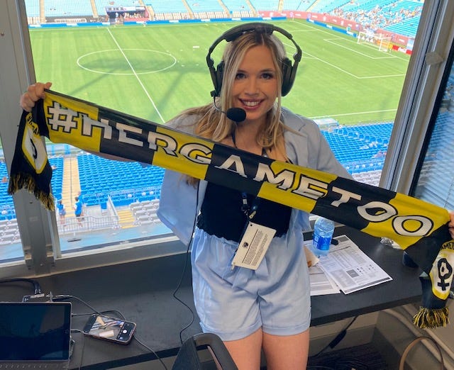 Behind the Charlotte FC microphone, with broadcaster Jessica Charman