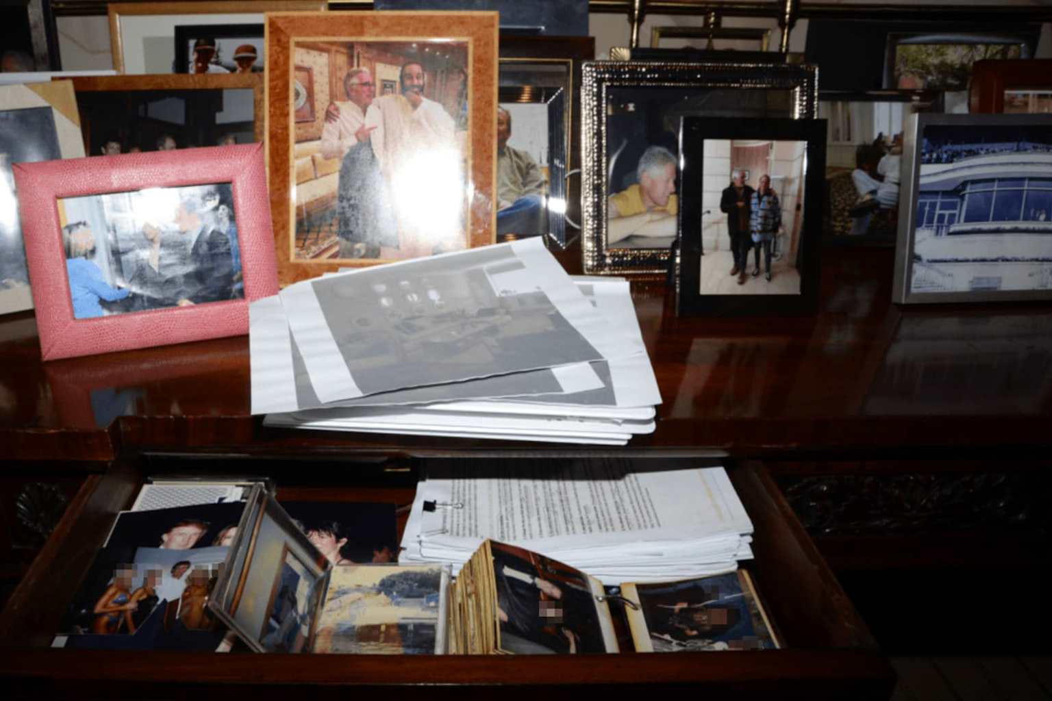 DOJ restores Trump photo to Epstein files after backlash episode artwork