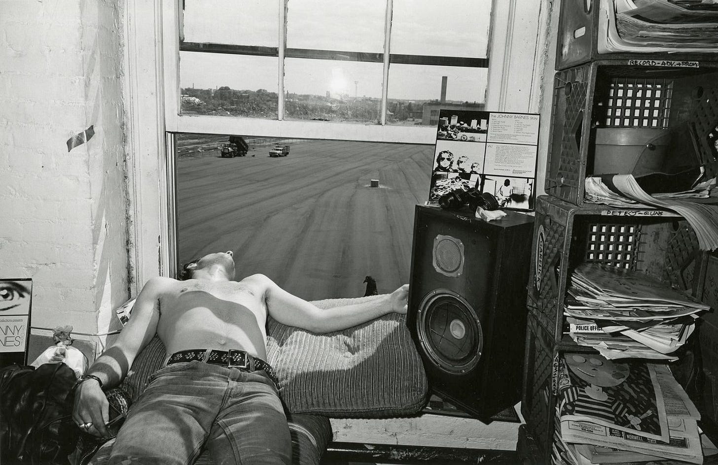 A person lying on a window sill

AI-generated content may be incorrect.