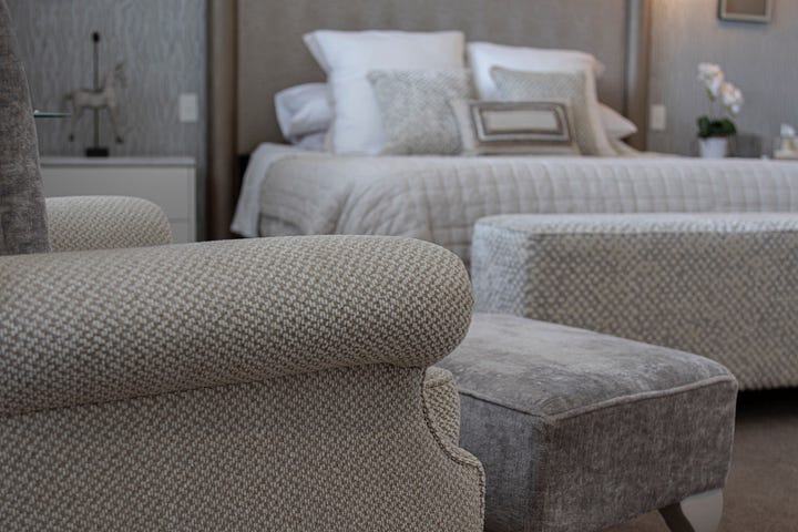 luxurious main bedroom in an apartment designed by Plush Design Interiors and Penelope Herbert