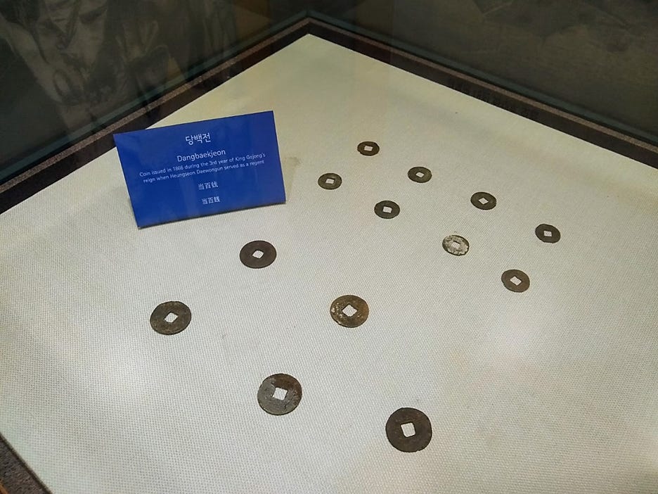 A group of coins on a table
AI-generated content may be incorrect. A group of coins on a table
AI-generated content may be incorrect.
