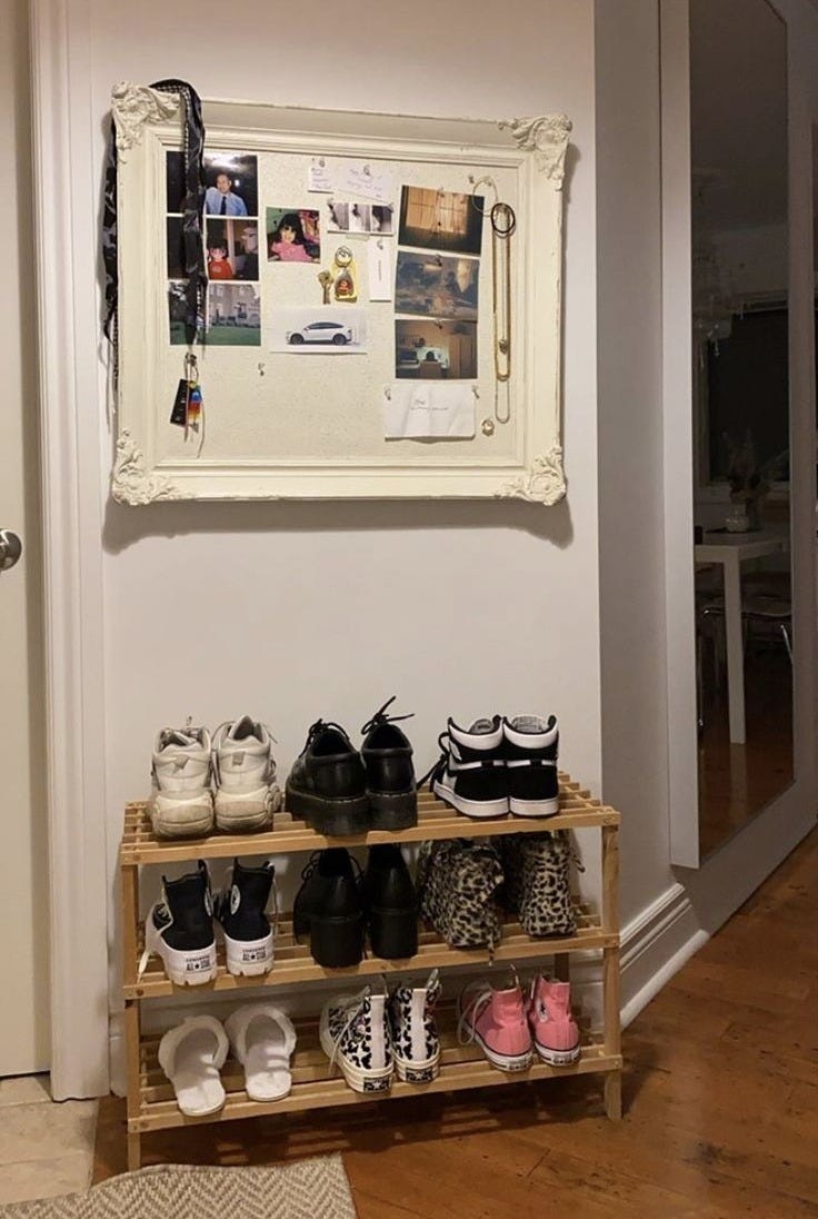 This may contain: there is a shoe rack with shoes on it