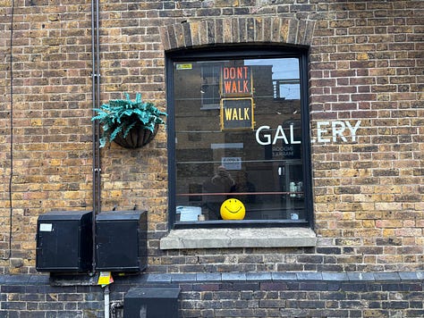 From a quiet street in Deal to the narrow hallway and intimate rooms beyond, the Walk Don't Walk Gallery invites visitors to step inside, be nosey, and discover an art space where humour, conversation and curiosity shape the experience as much as the works on the walls. — © Kent Chronicles