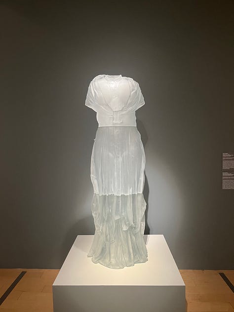 Anthony James , "80" Great Rhombicosidodecahedron," 2021 (left), To Move Toward the Limits of Living: LGBTQ+ Works from the Collection (center), Karen LaMonte, Pianist's Dress Impression, 2005 (right)