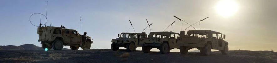Army vehicles on the ridge, as soldiers from the 2nd Brigade, 1st Cavalry Division, prepare to attack the enemy in the town nearby, during an early morning training exercise at the National Training Center at Fort Irwin, Calif., on April 12, 2022. (AP Photo/Lolita C. Baldor) **FILE** Army vehicles on the ridge, as soldiers from the 2nd Brigade, 1st Cavalry Division, prepare to attack the enemy in the town nearby, during an early morning training exercise at the National Training Center at Fort Irwin, Calif., on April 12, 2022. (AP Photo/Lolita C. Baldor) **FILE**