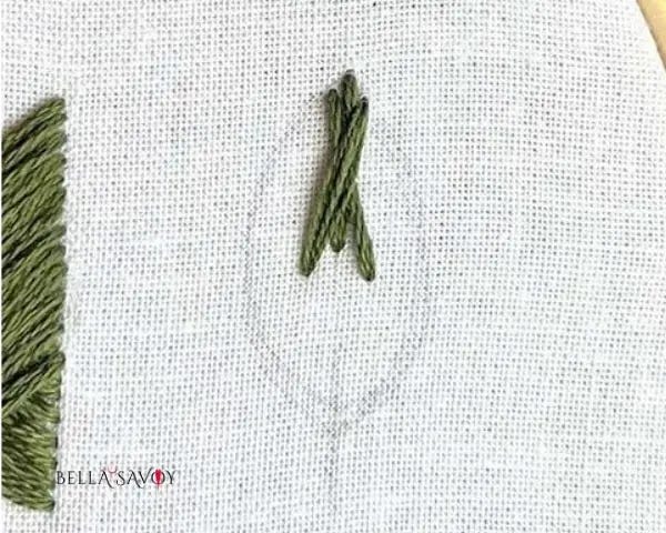 fishbone stitch started at the tip of a leaf template