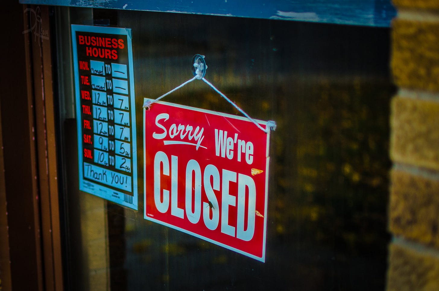 'Sorry, we're closed' sign 'Sorry, we're closed' sign