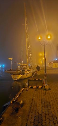 Dinner at Ayakos Italian restaurant. Kanaloa and Takaroa parked in Kurashiro in fog.