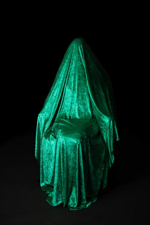 A woman who had hyperemesis hidden under a velvet sheet