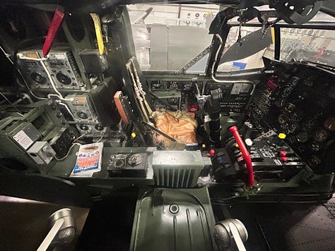 helicopter, plane, signs, stairs, cockpit, person