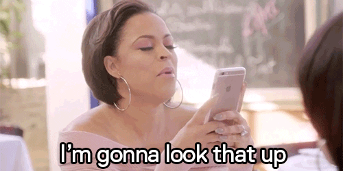 woman holding cell phone with text "I'm gonna look that up."