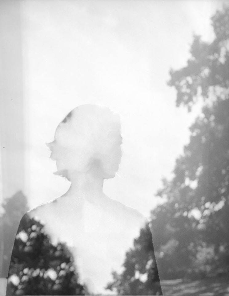 May be a black-and-white image of polaroid