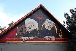 A barn in Gdansk with Statler and Waldorf on it