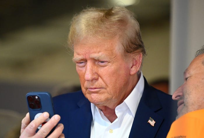 Photos Show Trump's Been an iPhone Guy for a While Now - Business Insider