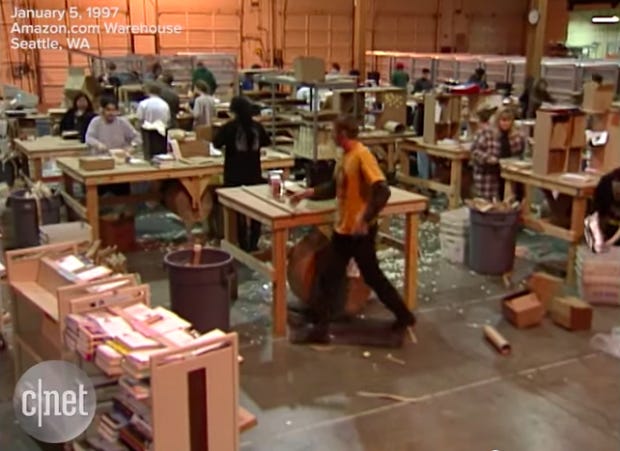 Photo via YouTube/ CNET/Inside Amazon's Seattle warehouse in 1997