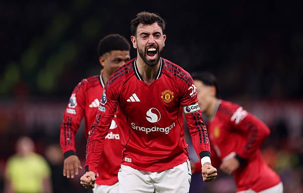 Bruno Fernandes of Manchester United celebrates after teammate Matheus Cunha scores his team's fourth goal during the Premier League match between... Bruno Fernandes of Manchester United celebrates after teammate Matheus Cunha scores his team's fourth goal during the Premier League match between...