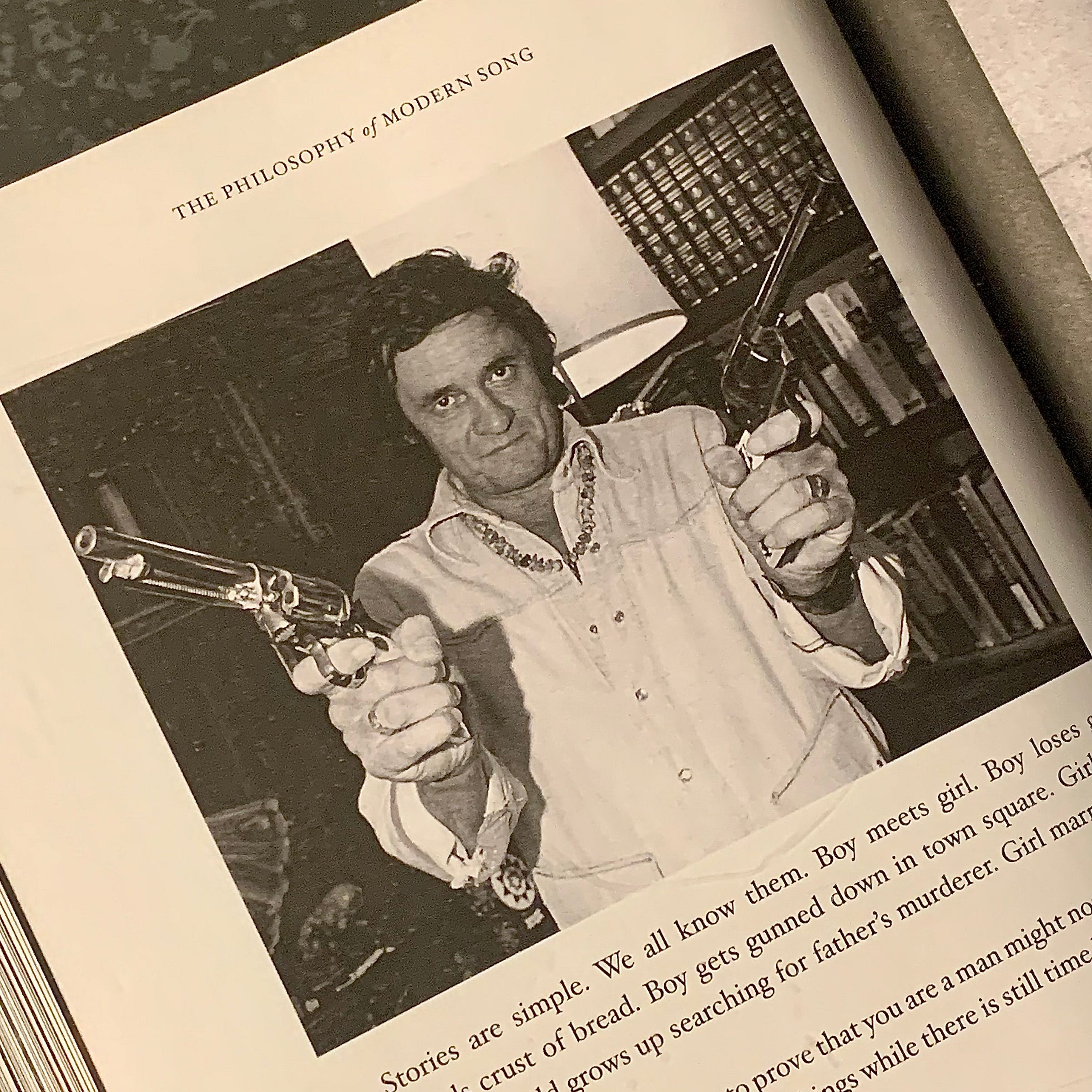 Johnny cash drawing two pistols