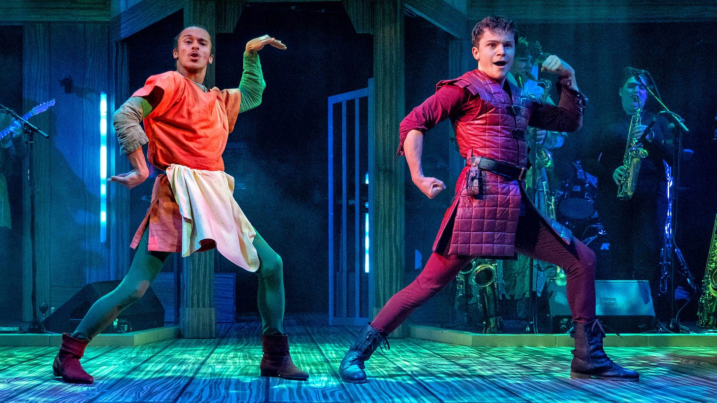 Kemi Clarke (Much), Finn Torkington (Will) dance in their colourful jerkins