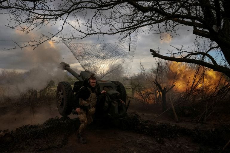 FILE PHOTO: Ukrainian service members from a 3rd separate assault brigade of the Armed Forces of Ukraine, fire a howitzer D30 at a front line, amid Russia's attack on Ukraine, near the city of Bakhmut, Ukraine April 23, 2023. REUTERS/Sofiia Gatilova/File Photo FILE PHOTO: Ukrainian service members from a 3rd separate assault brigade of the Armed Forces of Ukraine, fire a howitzer D30 at a front line, amid Russia's attack on Ukraine, near the city of Bakhmut, Ukraine April 23, 2023. REUTERS/Sofiia Gatilova/File Photo