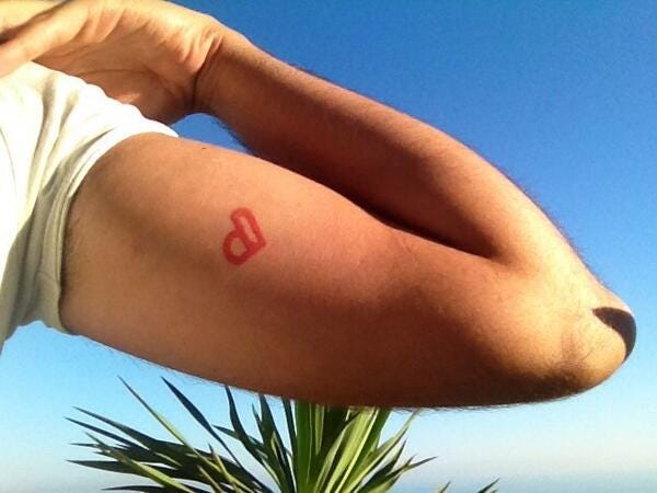 Fan who got a CPLUV tattoo