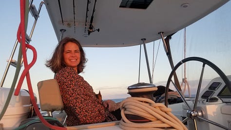 Images of author, Rosa Linda Román on a boat, with a computer or journal in hand for writing.