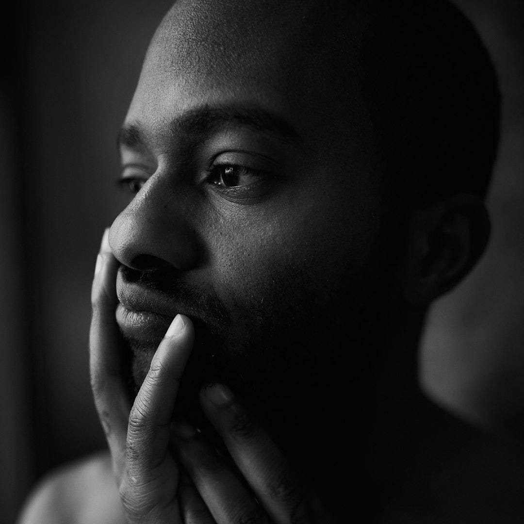 grayscale photo of topless boy