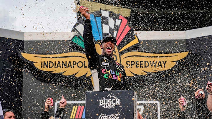 NASCAR Cup Series driver Bubba Wallace (23) celebrates winning Sunday, July 27, 2025, the Brickyard 400 at Indianapolis Motor Speedway.