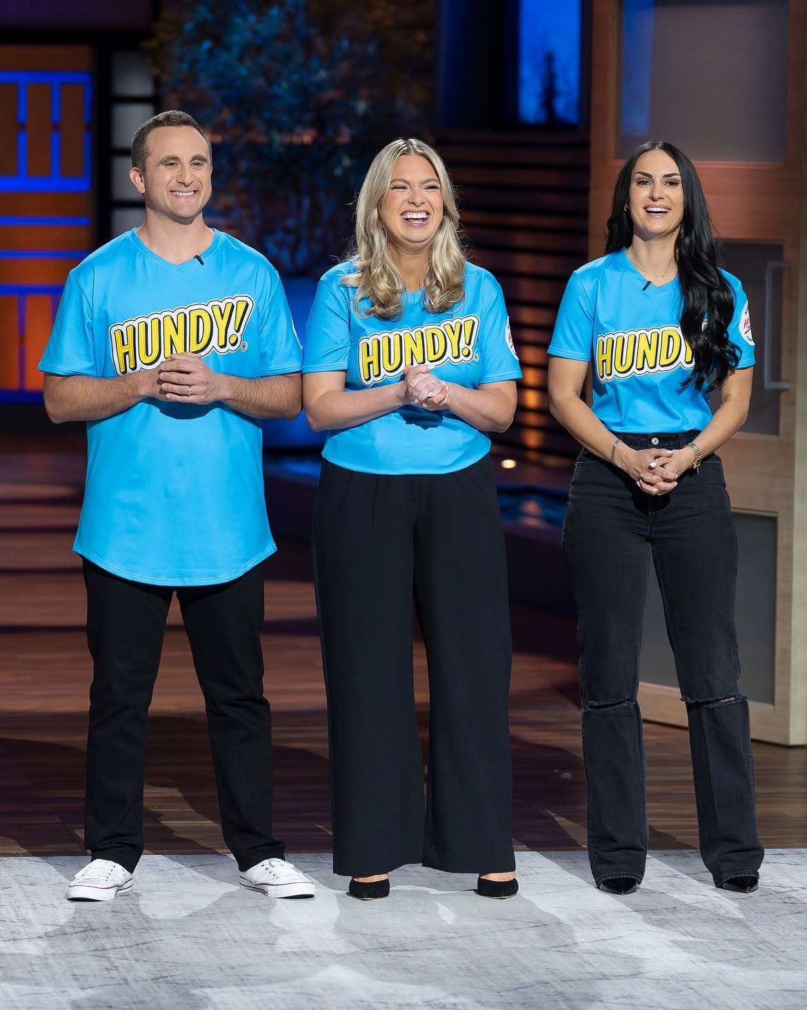 The Hundy team wearing blue and yellow Hundy t shirts on Shark Tank (ABC) The Hundy team wearing blue and yellow Hundy t shirts on Shark Tank (ABC)