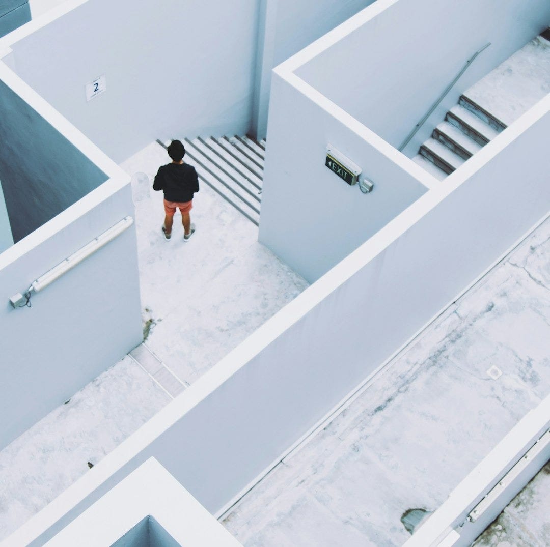man in maze-like building