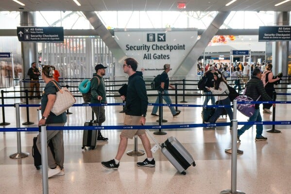Airline passengers make their way through the security lines in Terminal E at George Bush Intercontinental Airport, in Houston, Sunday, March 29, 2026. (Brett Coomer/Houston Chronicle via AP, File) Airline passengers make their way through the security lines in Terminal E at George Bush Intercontinental Airport, in Houston, Sunday, March 29, 2026. (Brett Coomer/Houston Chronicle via AP, File)