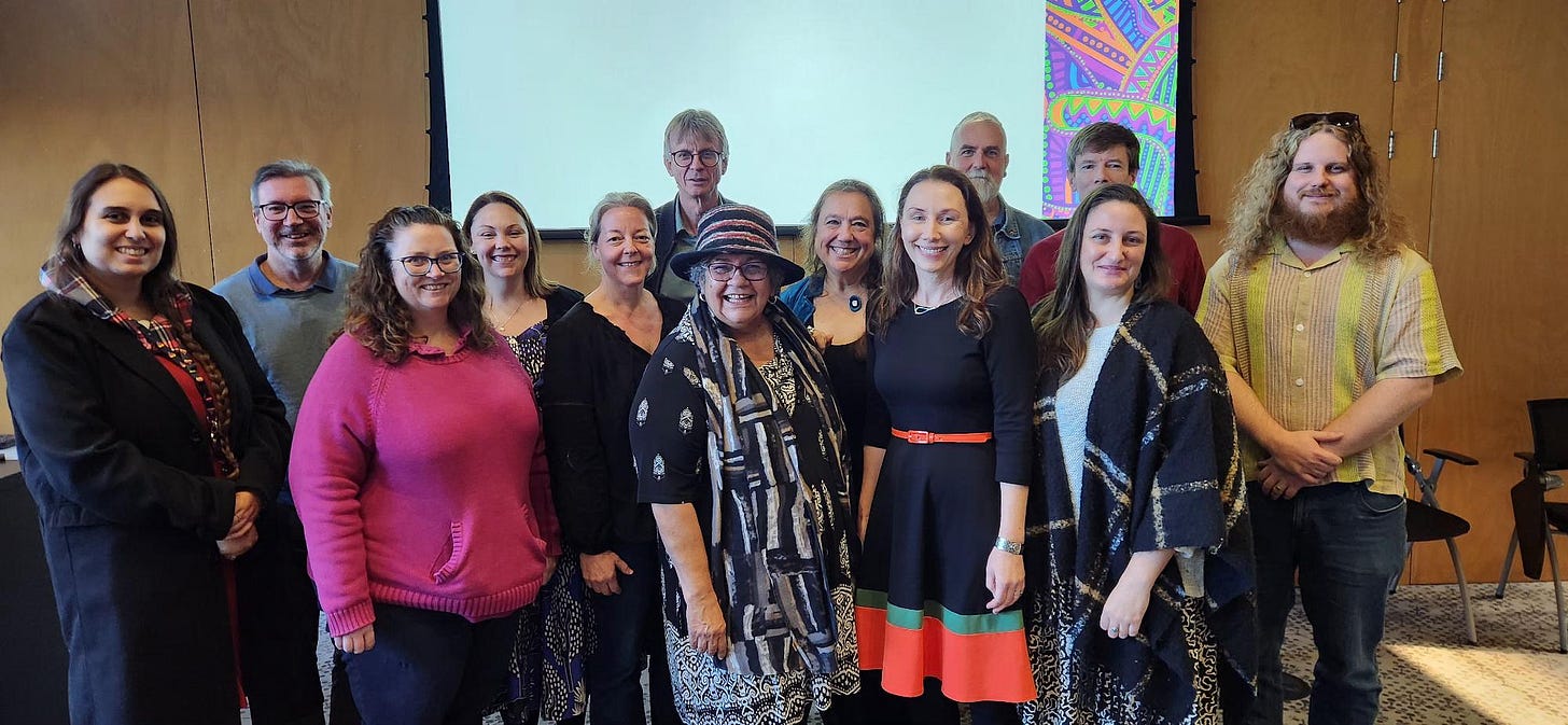 A group of people posing for a photo

AI-generated content may be incorrect.