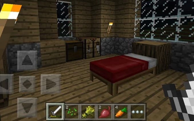 This may contain: a bedroom in minecraft with a bed, desk and windows on the wall behind it