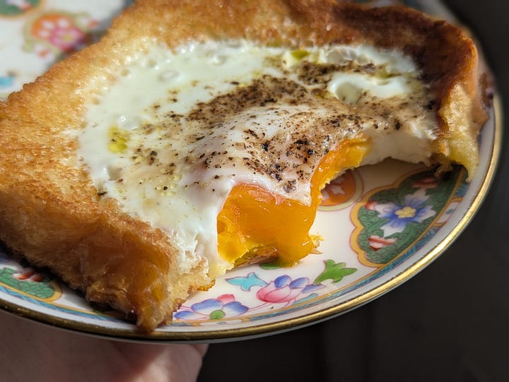 One eyed toast, cutting the hole with a cup.