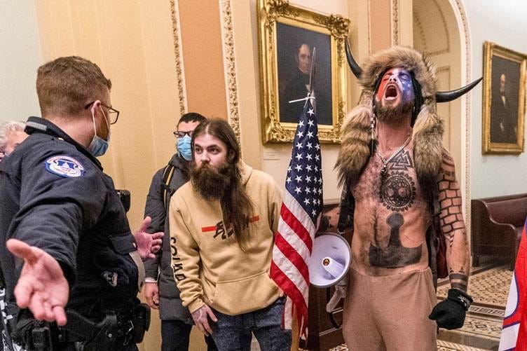 QAnon shaman' says former lawyer failed him over Jan. 6 videos - POLITICO