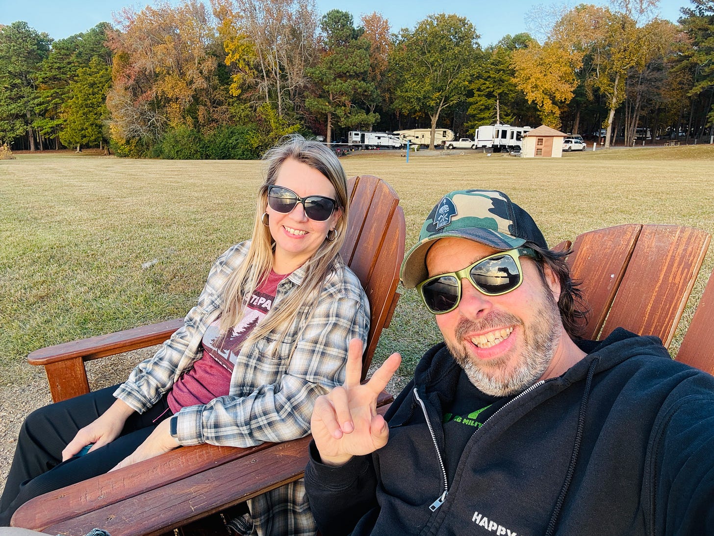 Donetta and James sitting and relaxing by the lake.