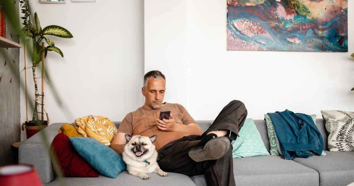 Middle aged man looking at phone