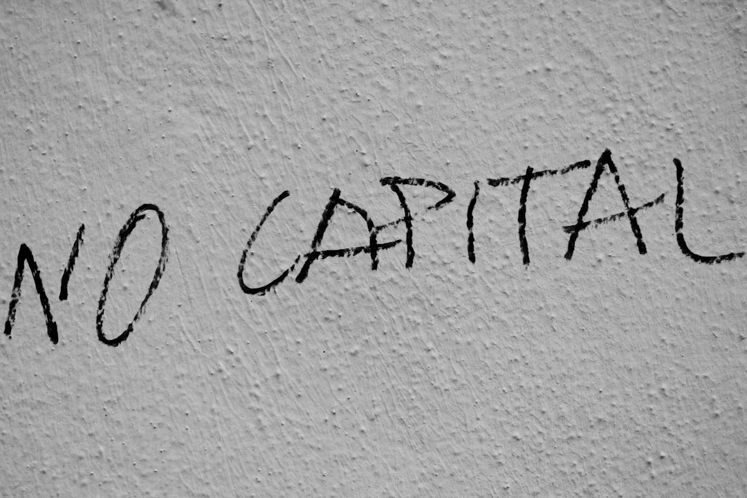 The word no capital written on a wall