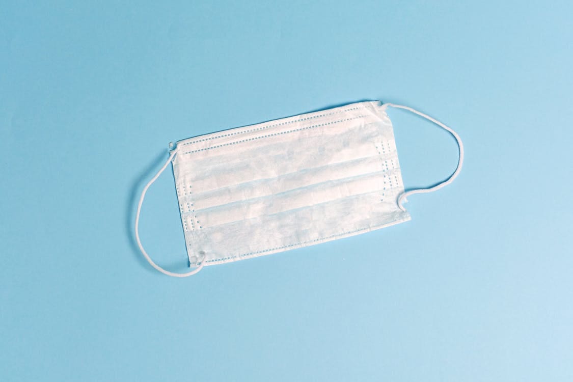 Face Mask on Blue Background Face Mask on Blue Background