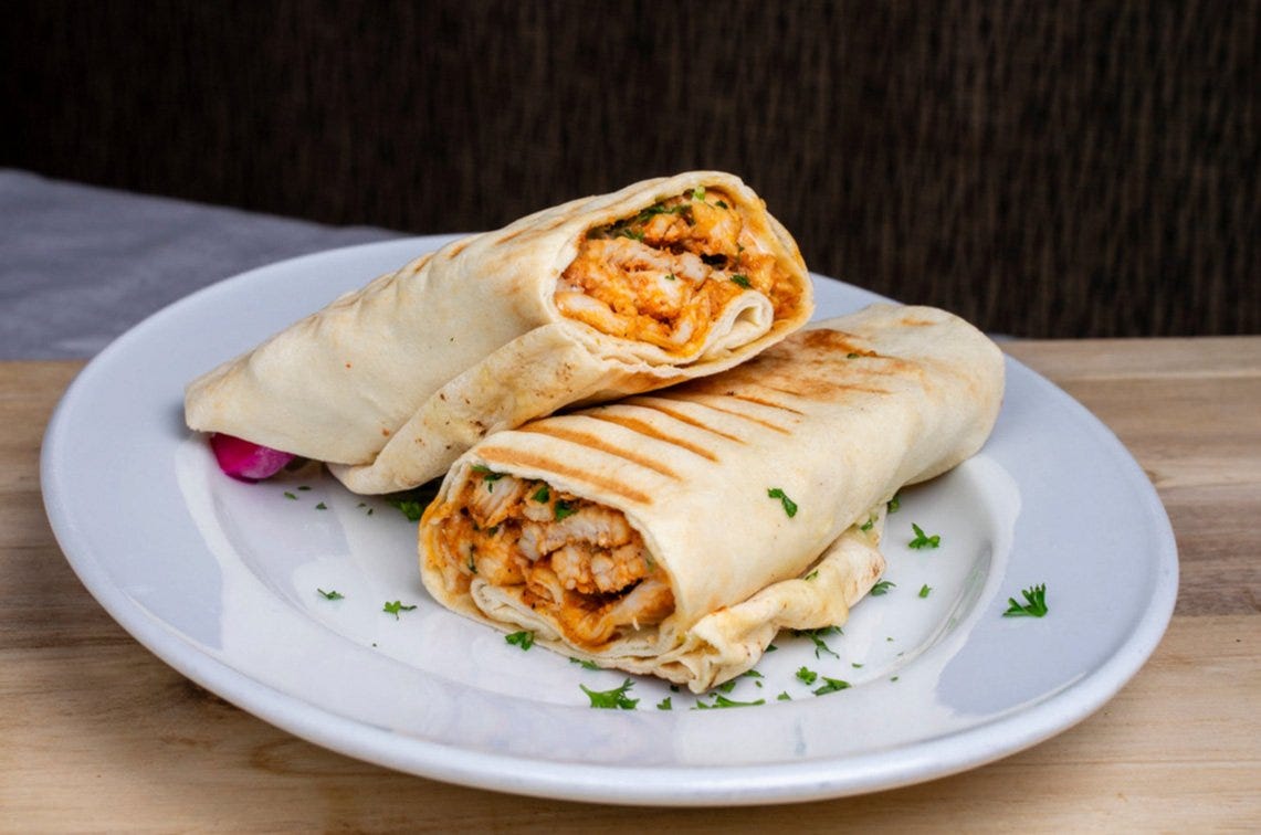Shawarma wrap on a plate Shawarma wrap on a plate