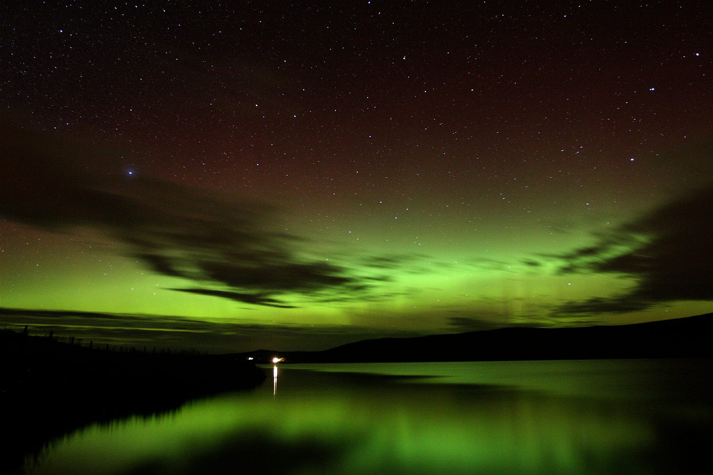 Aurora borealis reflected in water