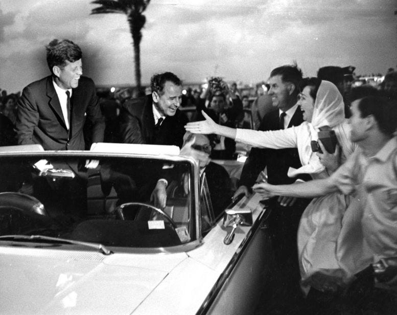 President John F. Kennedy in a convertible leaving for the Americana Hotel in Bal Harbour on Monday, November 18, 1963. Courtesy of Florida State Archives.