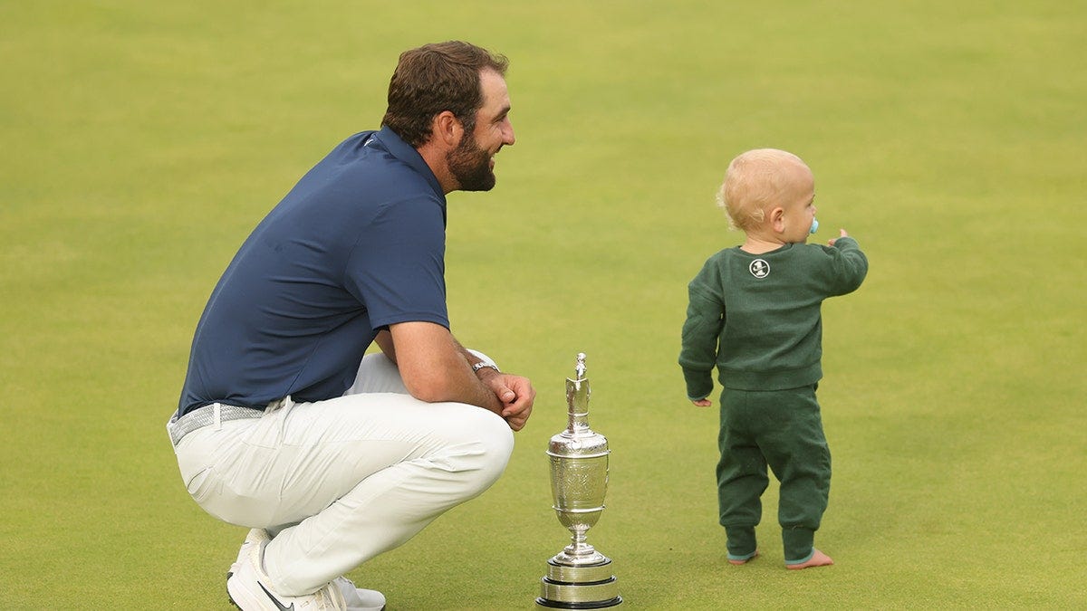 Scottie Scheffler with son, Bennett, at The Open Scottie Scheffler with son, Bennett, at The Open