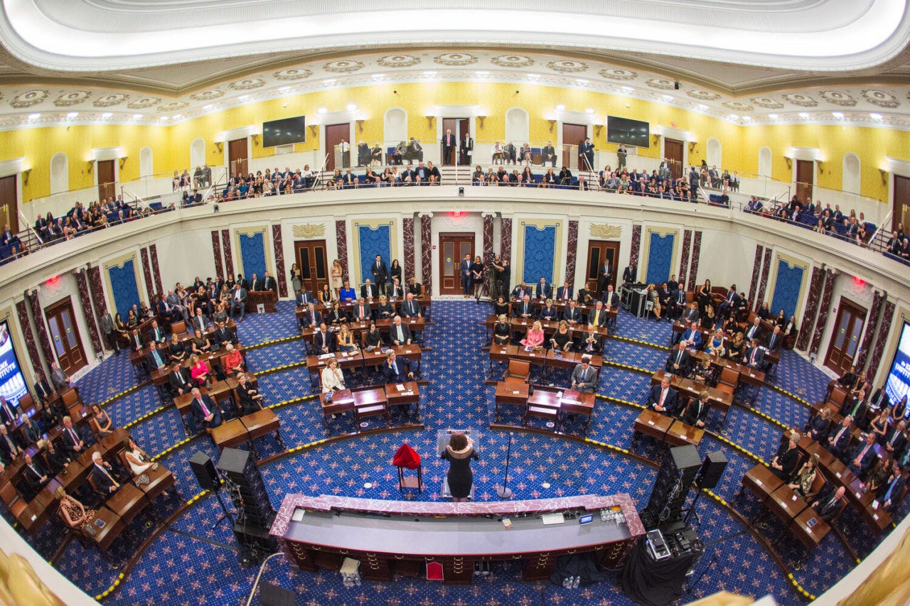 Revised voting rights bill rolled out in U.S. Senate, with Manchin on board