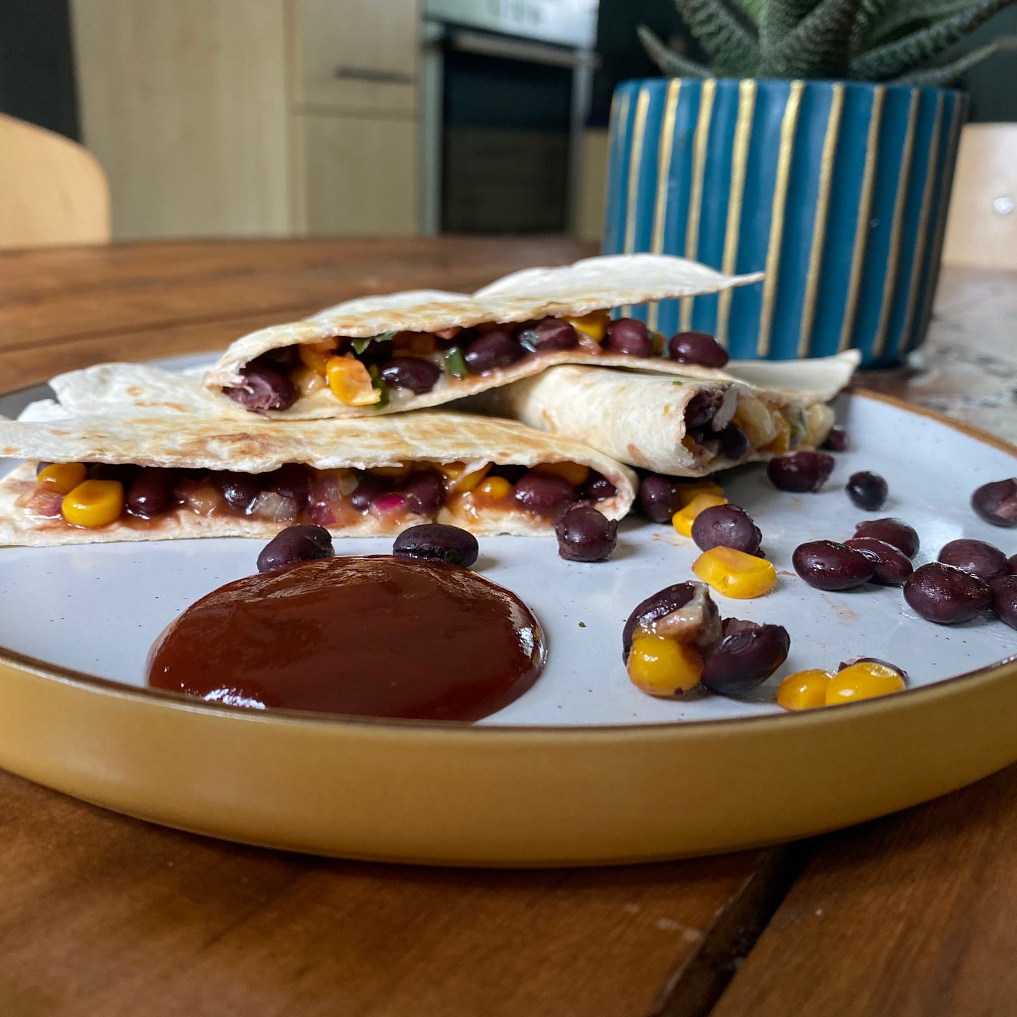 plate with black bean and sweetcorn quesadilla