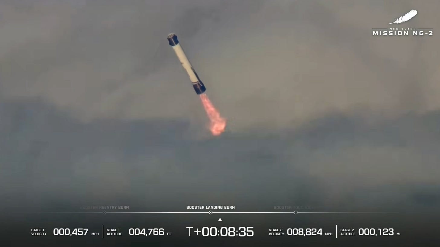 a large white-and-blue rocket fires its engines as it descends through clouds