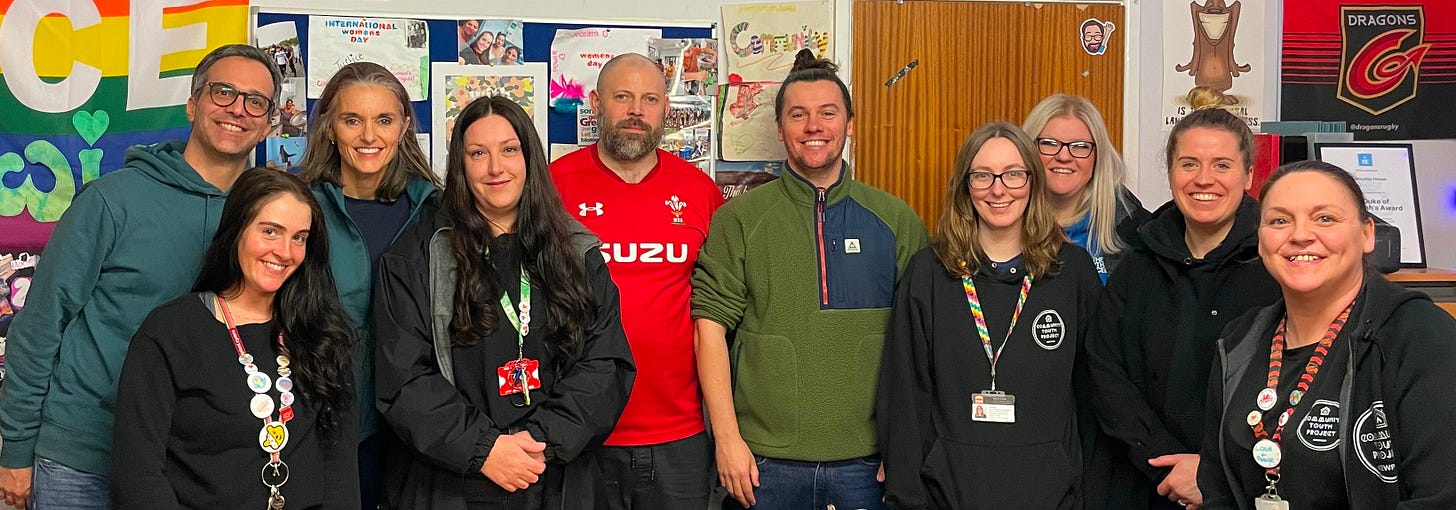10 smiling faces of staff at the Ferdinando and Luigi Innocenti Foundation, the Newport youth group and BBC Children in Need