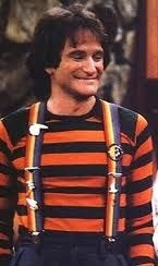 Robin Williams as Mork