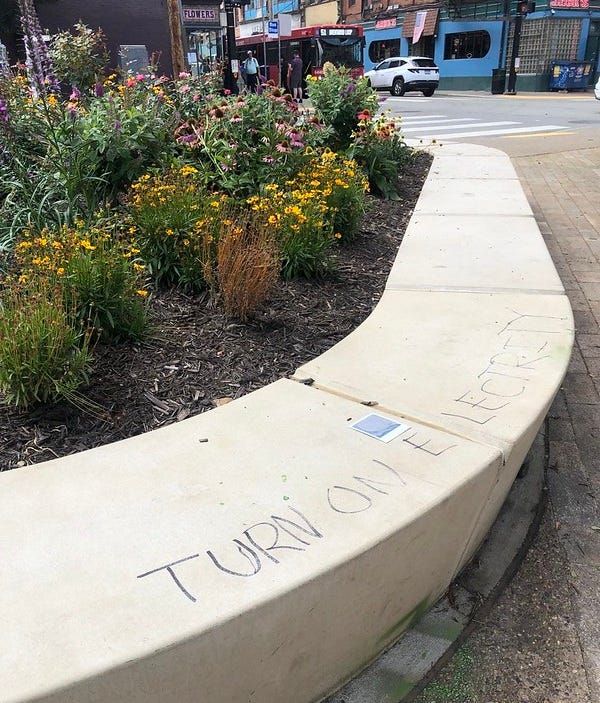 Scrawled in marker, Turn on Electricity.